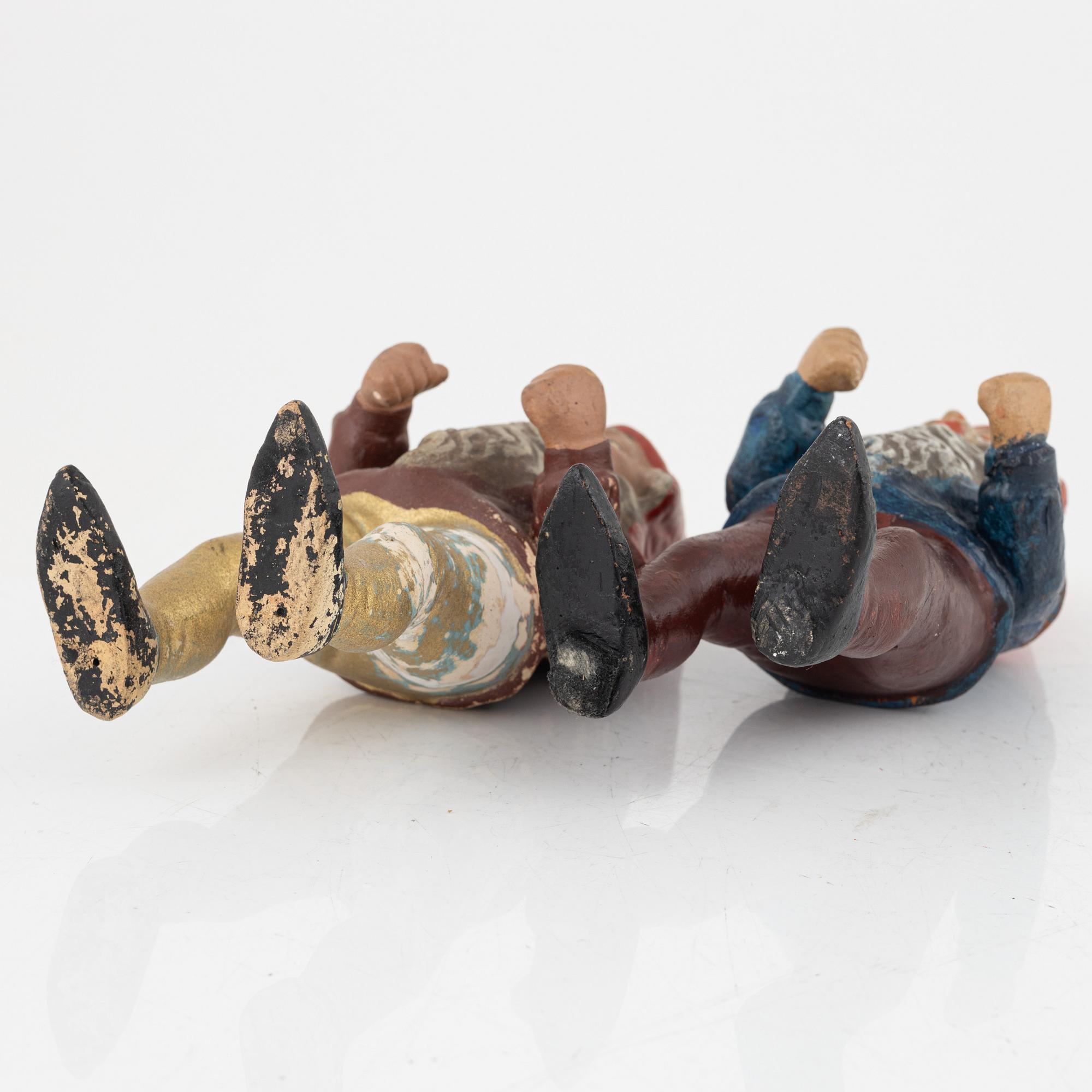 A group of seven gnomes, first half of the 20th Century.