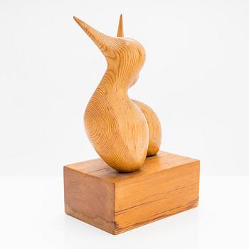 Sakari Pykälä, A wooden sculpture, signed and dated -69.