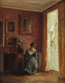 808. Carl Holsoe, Interiör med läsande kvinna vid fönster.