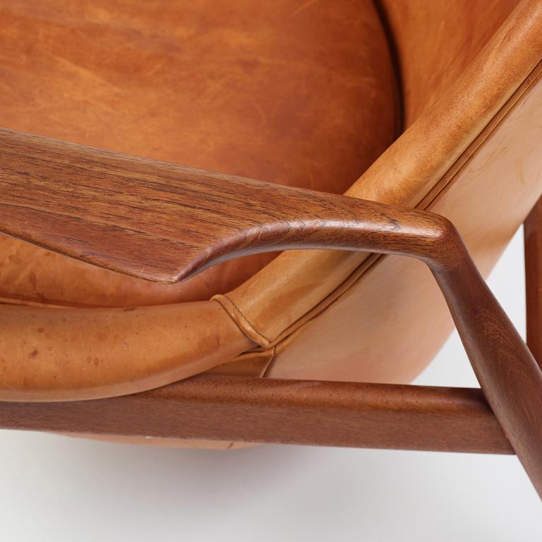 Ib Kofod-Larsen, a "Seal" teak and brown leather armchair, Olof Persson Möbler, Jönköping, Sweden 1950-60's.