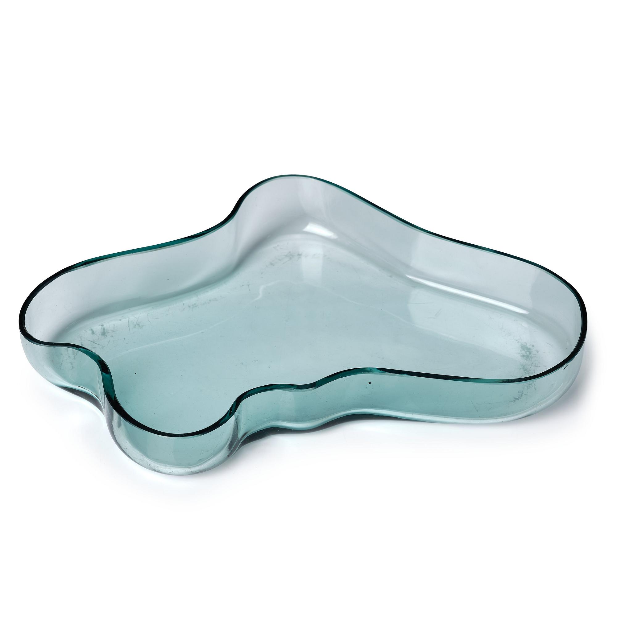 Alvar Aalto, a green tinted glass dish, model 9748 for Karhula Glassworks, Finland, in production 1937-1949.