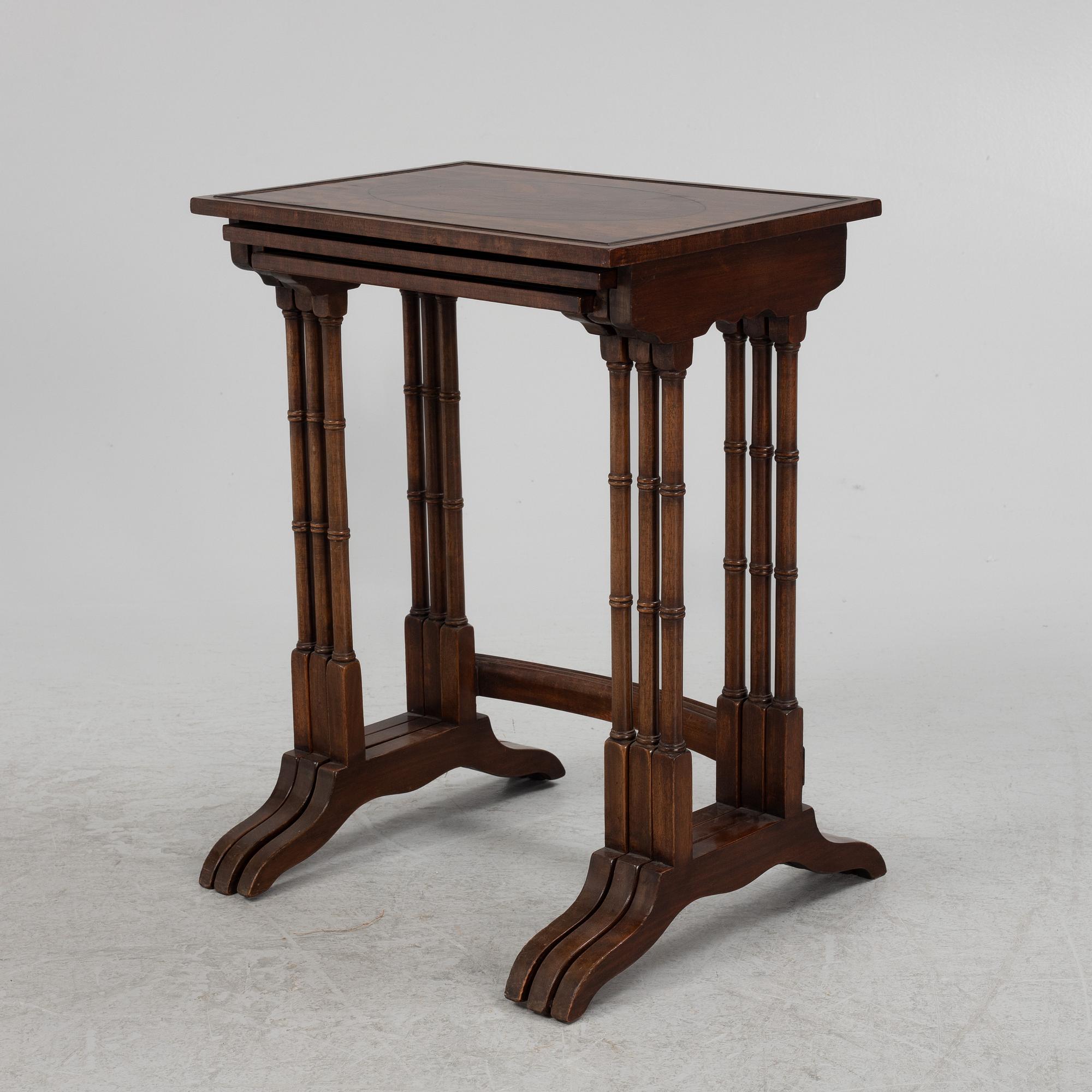 Three-piece nest of tables, mid-20th century.