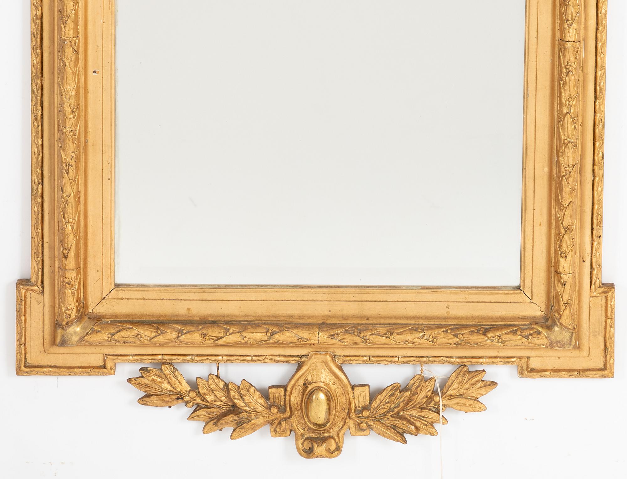 Spegel, gustaviansk stil, omkring 1900.
