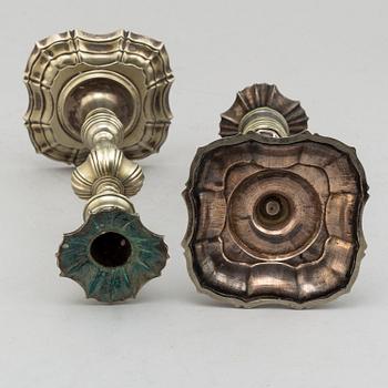 A pair of paktong candlesticks, second half of the 18th century.