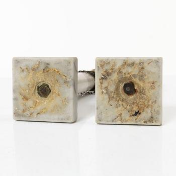 A pair of Gustavian brass and marble candlesticks, circa 1800.