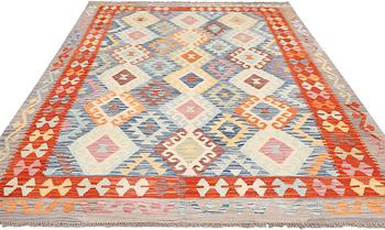 A Kilim carpet, c. 297 x 207 cm.