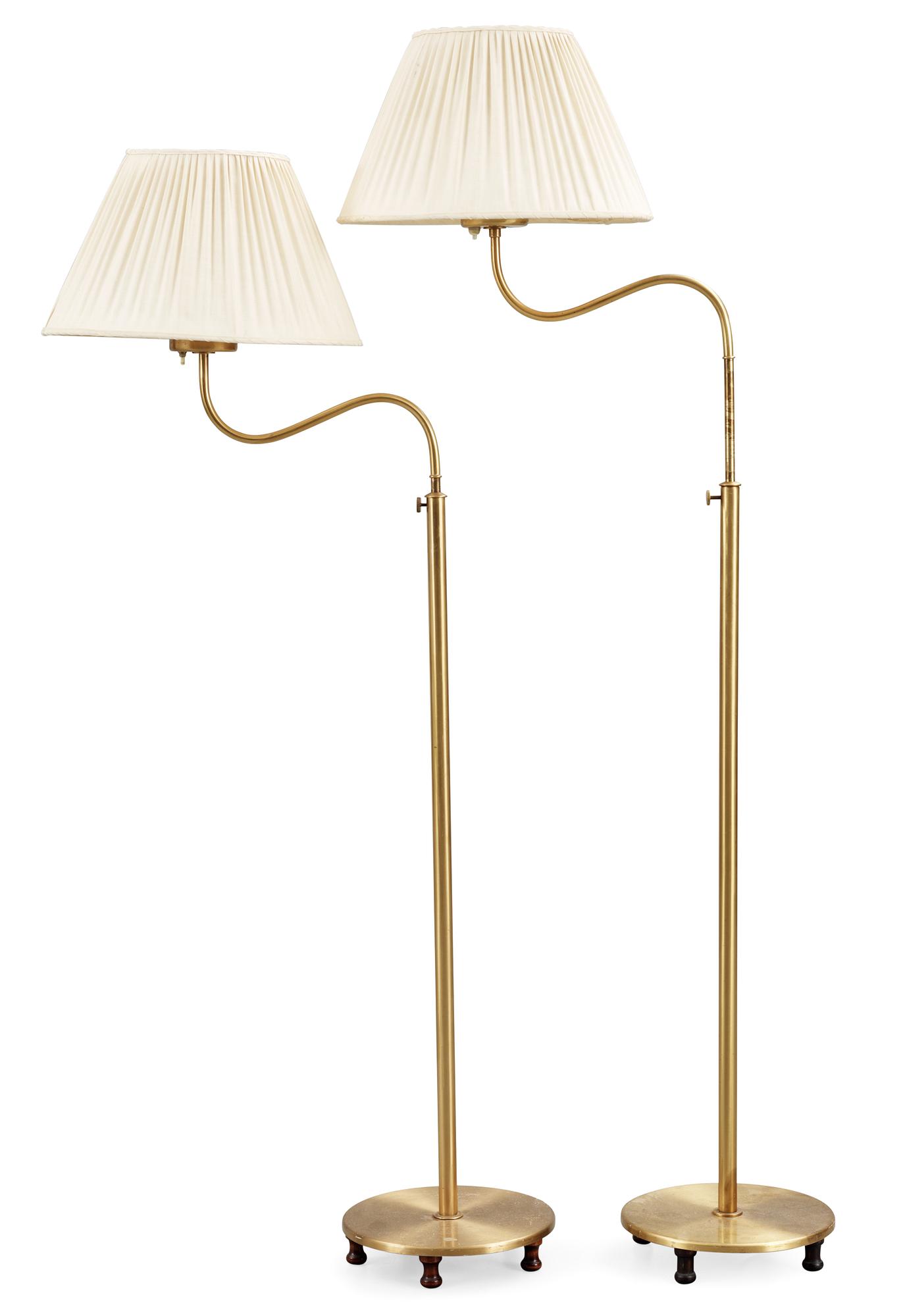 Two Josef Frank brass floor lamps, Svenskt Tenn, model 2568.