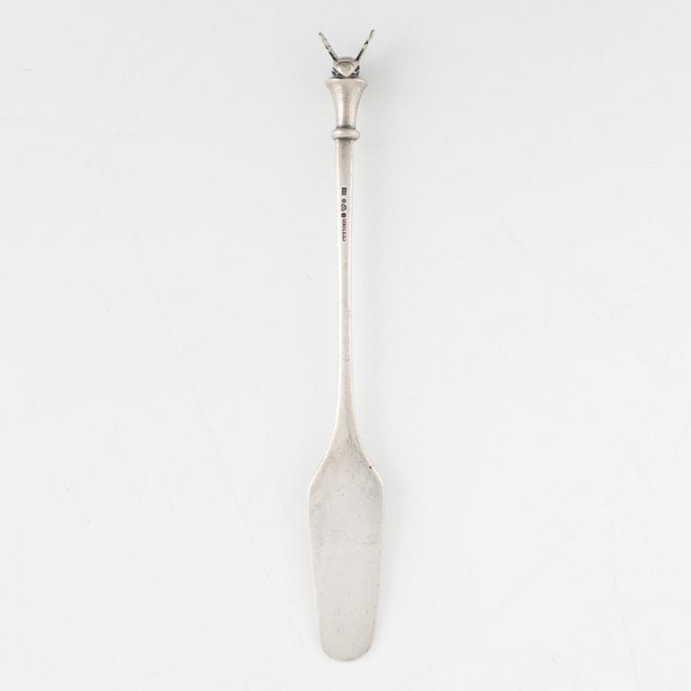 A silver honey spoon designed by Barbro Littmarck for W.A Bolin, Stockholm 1965.