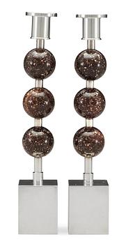 A pair of Sigurd Persson silver plated and porphyry candlesticks, Sweden.