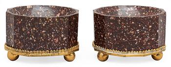 677. A pair of Swedish 19th century porphyry and gilt bronze salts.