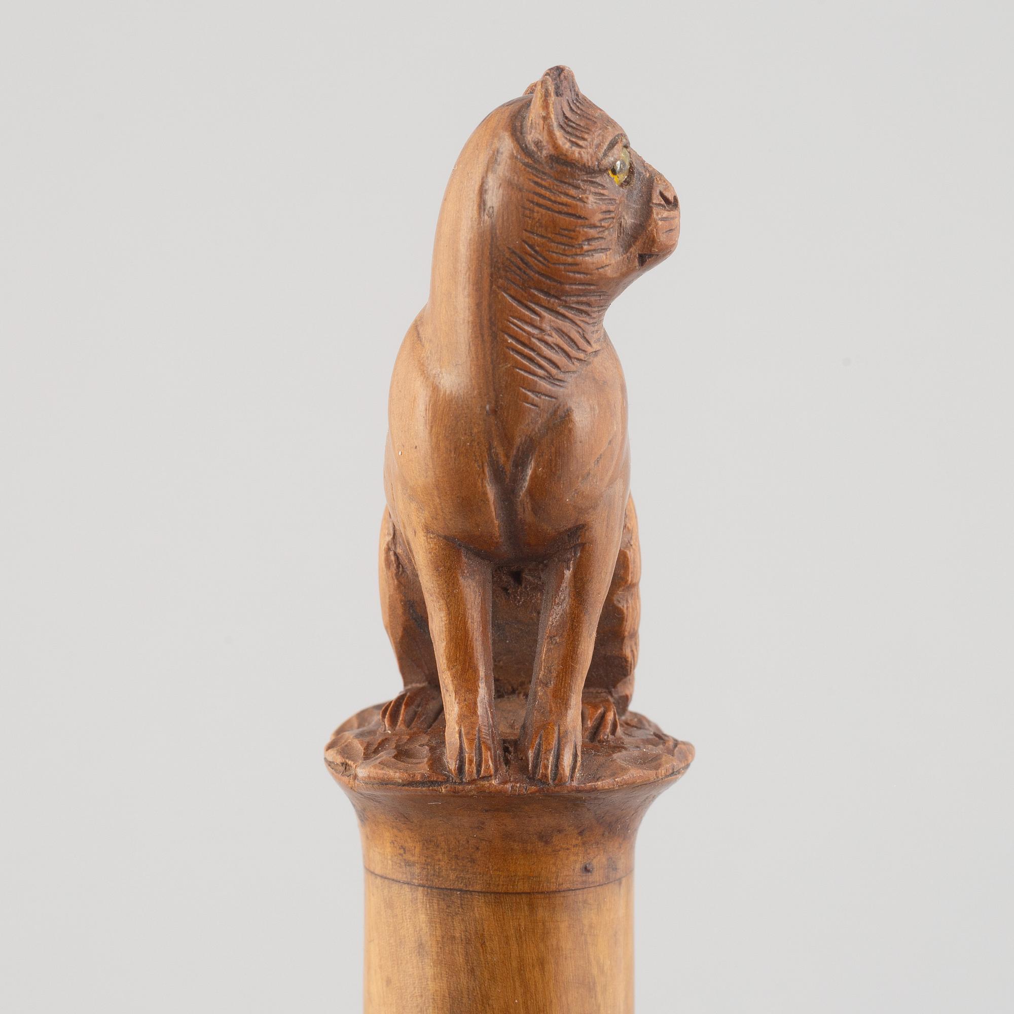 A carved wooden letter opener in the manner of Sophia Isberg, 19th century.
