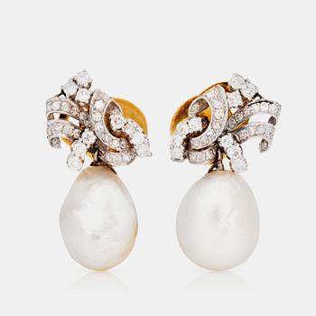 832. A pair of possibly oriental pearl and diamond earrings.