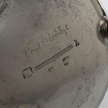 A 19th/20th century silver beaker and cover. Barock style.