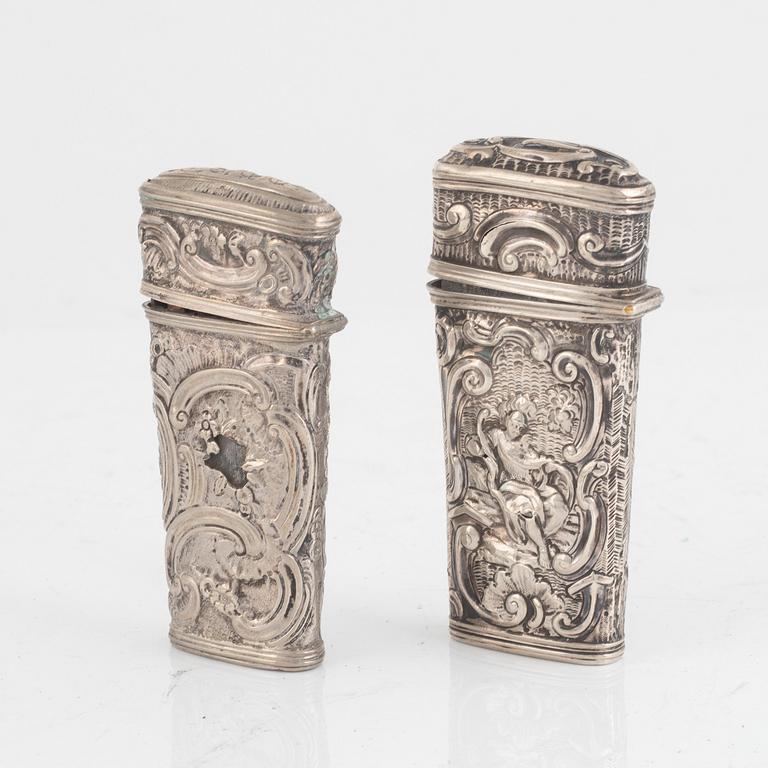 Two Historismus repousse silver etuis, later part of the 19th century.