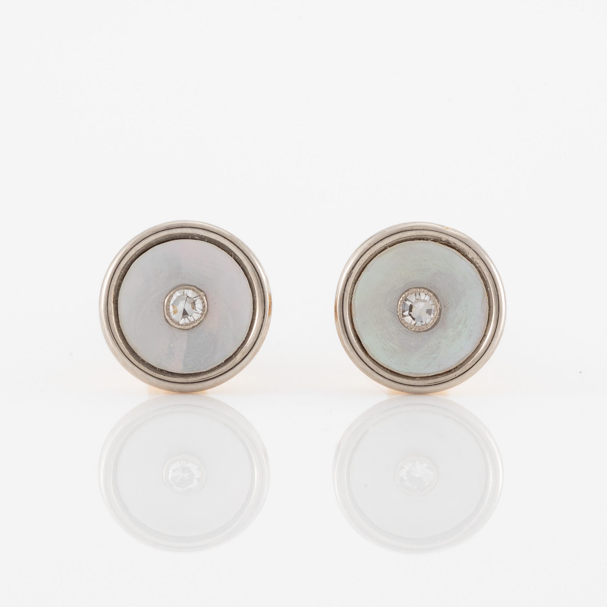 C.G Hallberg, cufflinks and shirt studs, two pairs, 18K gold with diamonds and mother-of-pearl.
