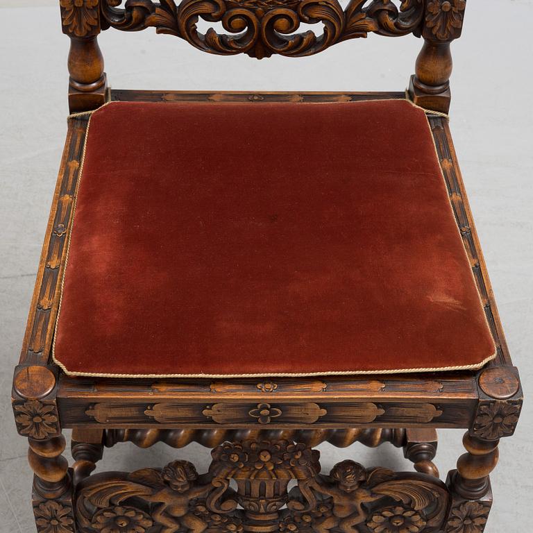 A pari of late 19th century baroque style chairs.