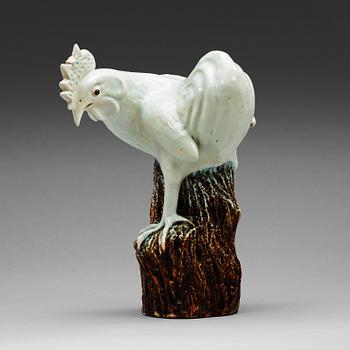 A white glazed figure of a rooster, Qing dynasty (1644-1912).