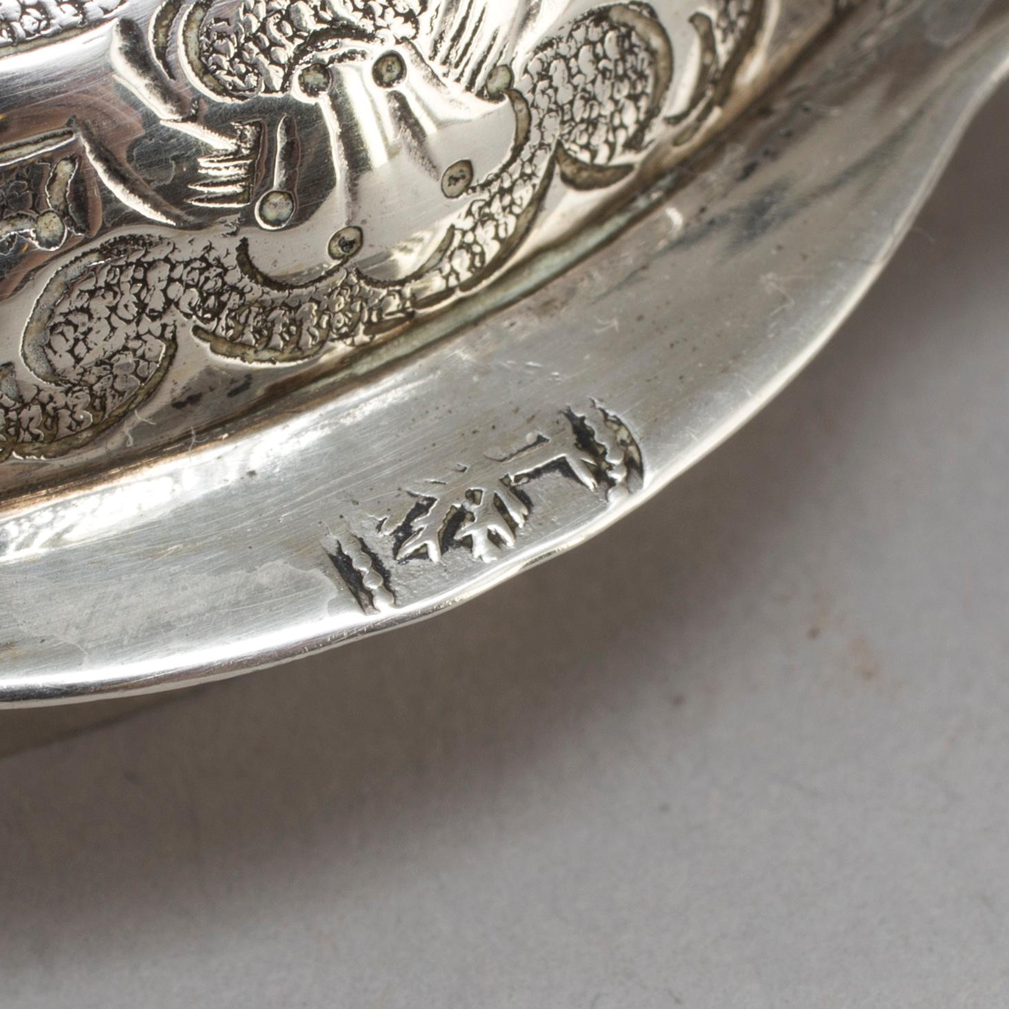 An 18th century silver beaker and cover, fantacy marks like Swedish pewter marks.