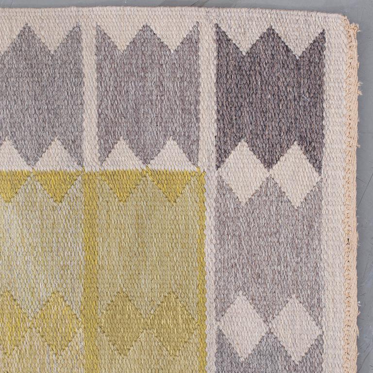 A CARPET, "Liljorna, gul", flat weave, designed by Ingrid Dessau for Hemslöjden Borås., around 216 x 165 cm.
