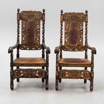 A pair of Baroque style armchairs, first half of the 20th Century.