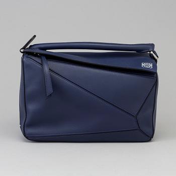 A blue claf leather Puzzle small bag by Loewe 2017.