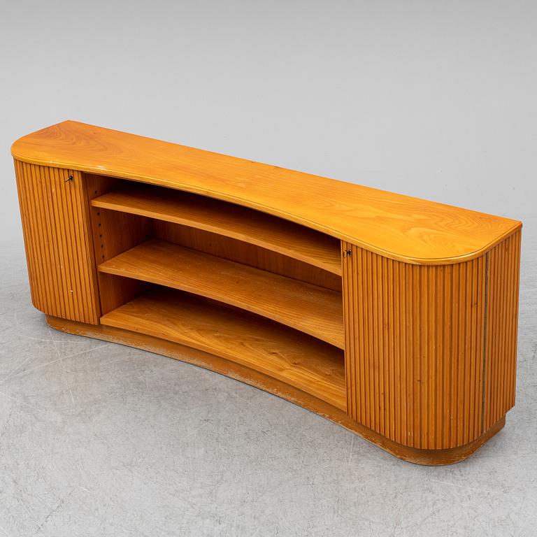 A 1940s elm veneered shelf.