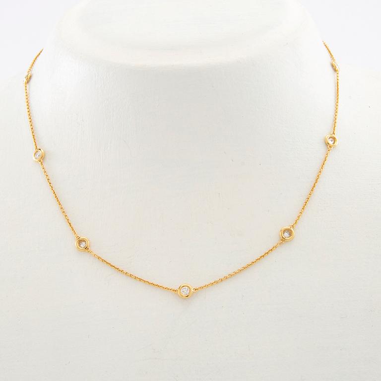 Necklace 18K gold with round brilliant-cut diamonds.