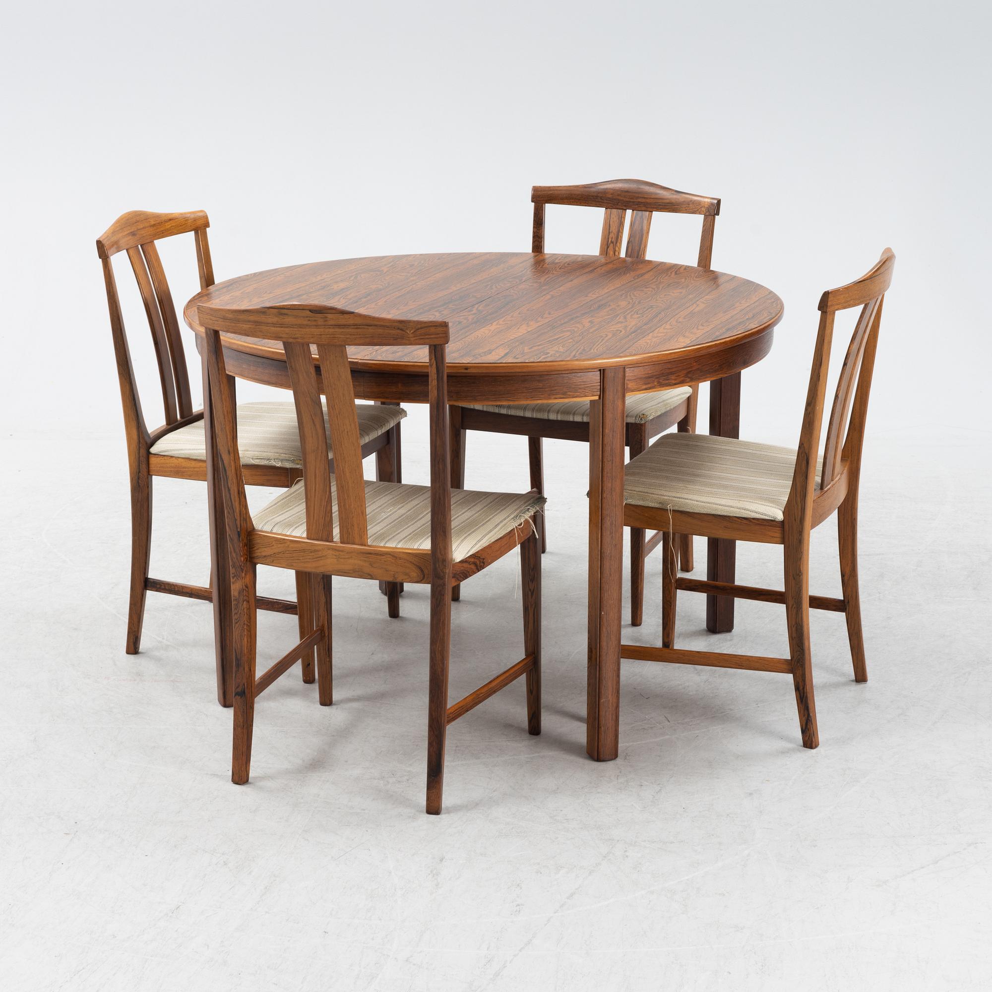 A 1960's/70's rosewood veneered dining group.