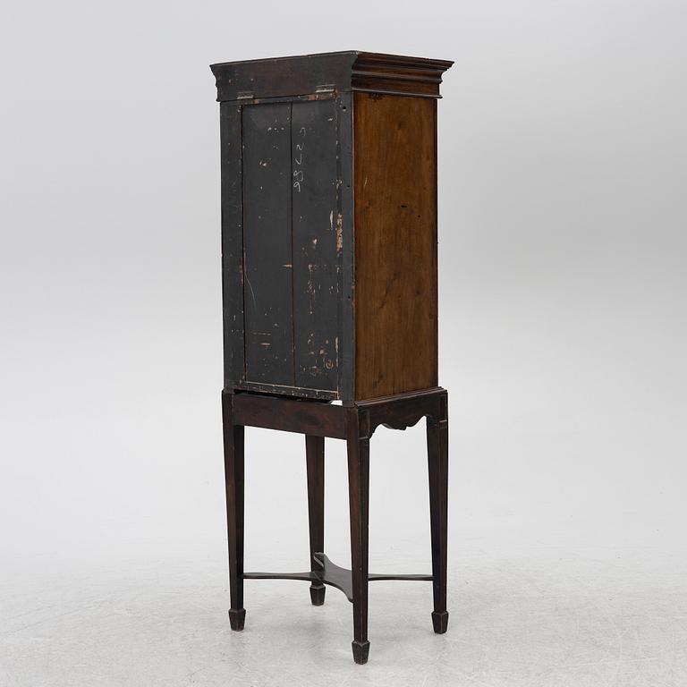 Display cabinet, likely England 19th century.