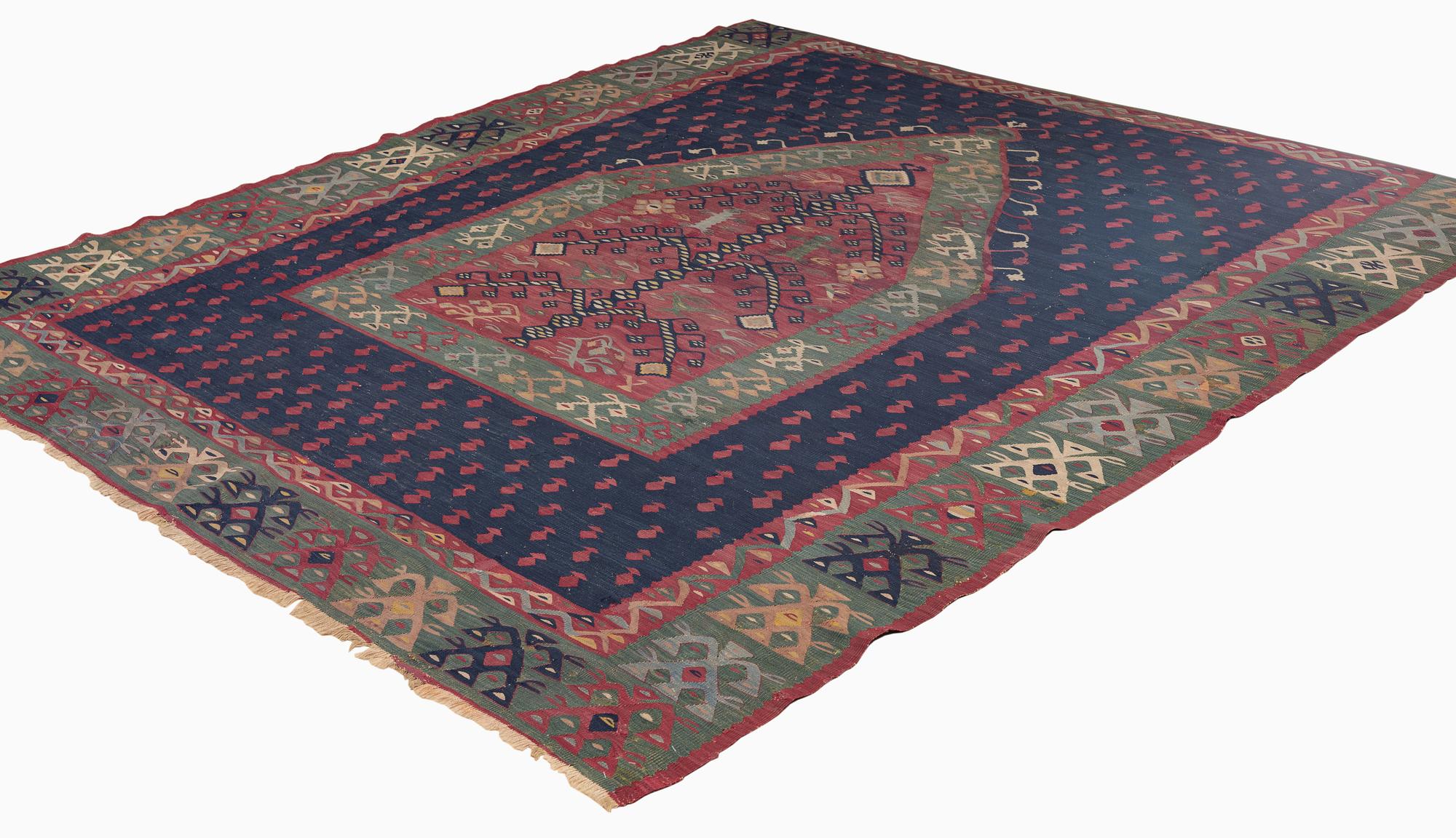 An antique Sarköy kelim, ca 239 x 214 cm.