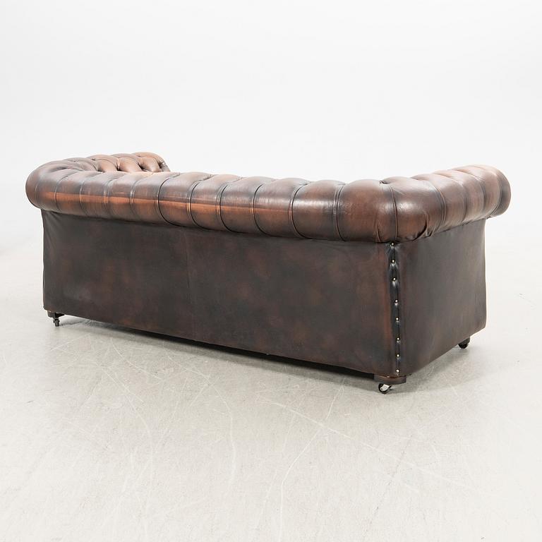 Sofa and armchair, Chesterfield, 20th century.