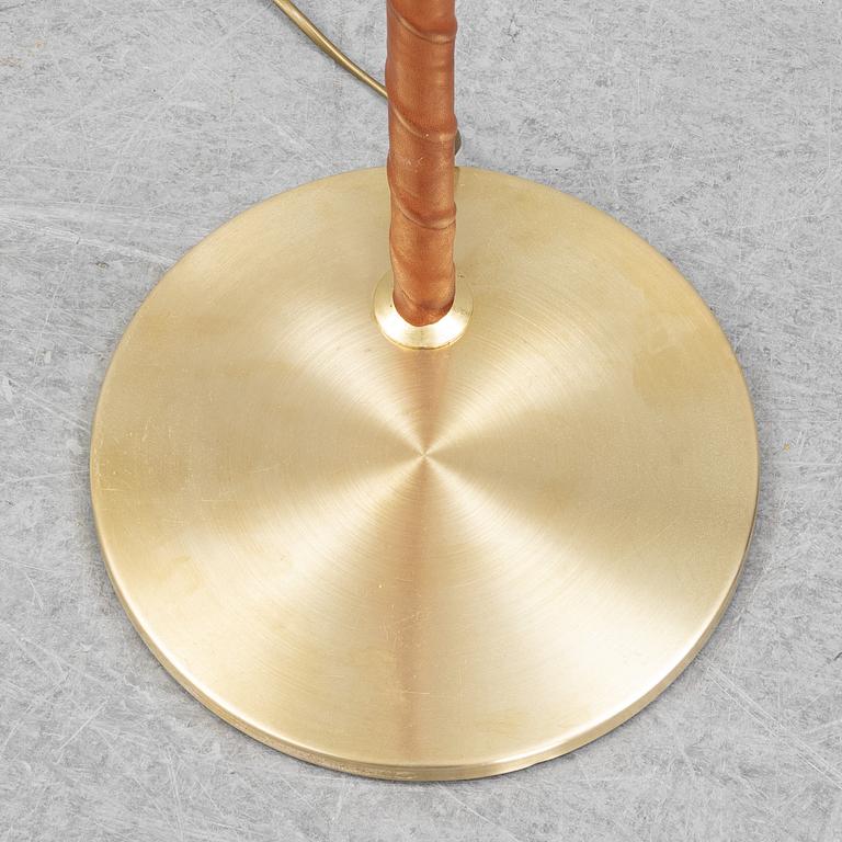 A brass floor light from EWÅ, second half of the 20th Century.