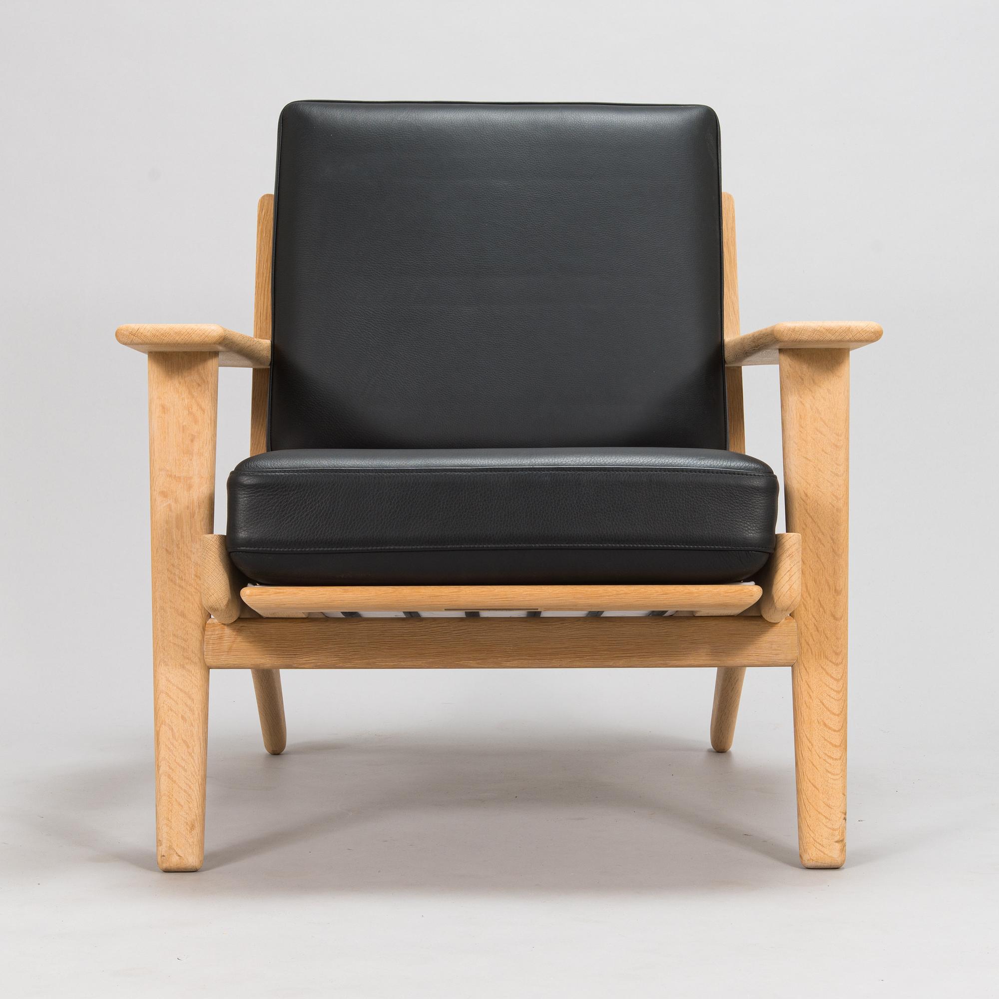 Hans J Wegner, a 2004 'GE-290' armchairs for Getama.
