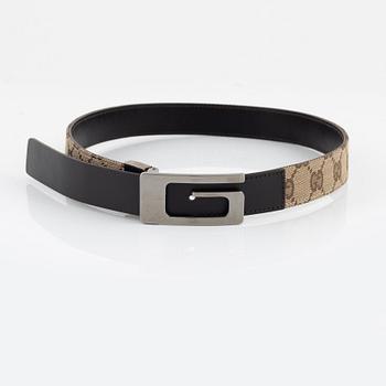 Gucci, a canvas and leather belt.