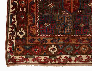 An antique Kurdish / Turkish carpet by the Herki Tribe, ca 276 x 116 cm.