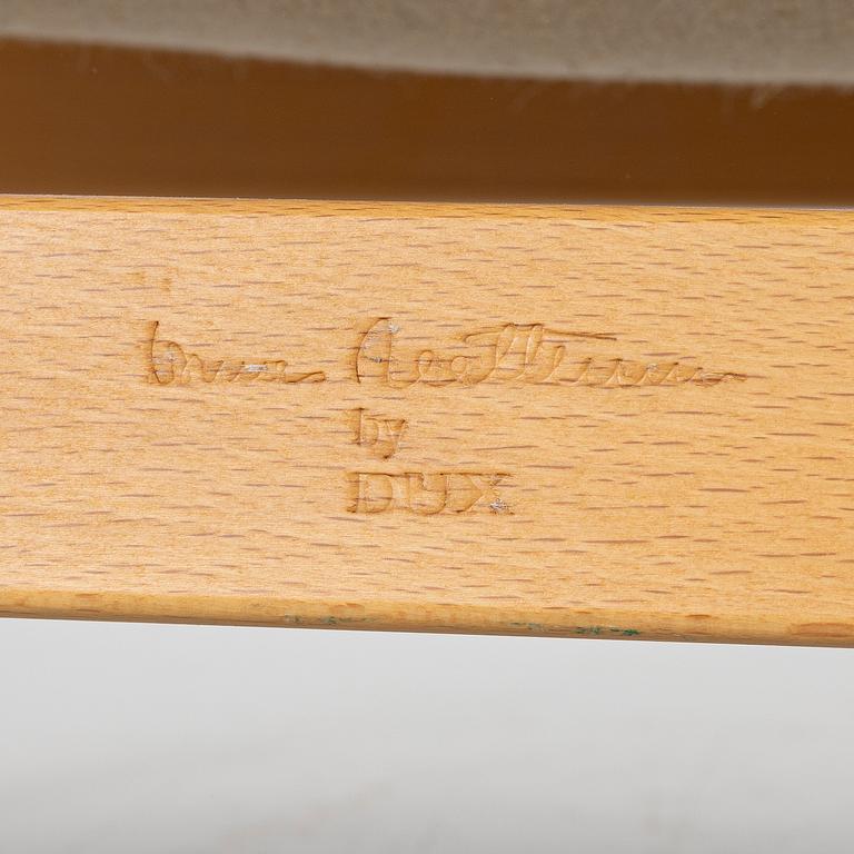 Bruno Mathsson, a 'Pernilla' armchair and ottoman, Dux.
