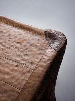 Gustaf Fjaestad, an Art Nouveau carved pine table, Arvika Sweden 1914, a double to the table in the Thiel Collection,