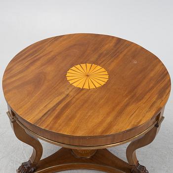 A mahogany veneered Empire style table, first half the 20th Century.