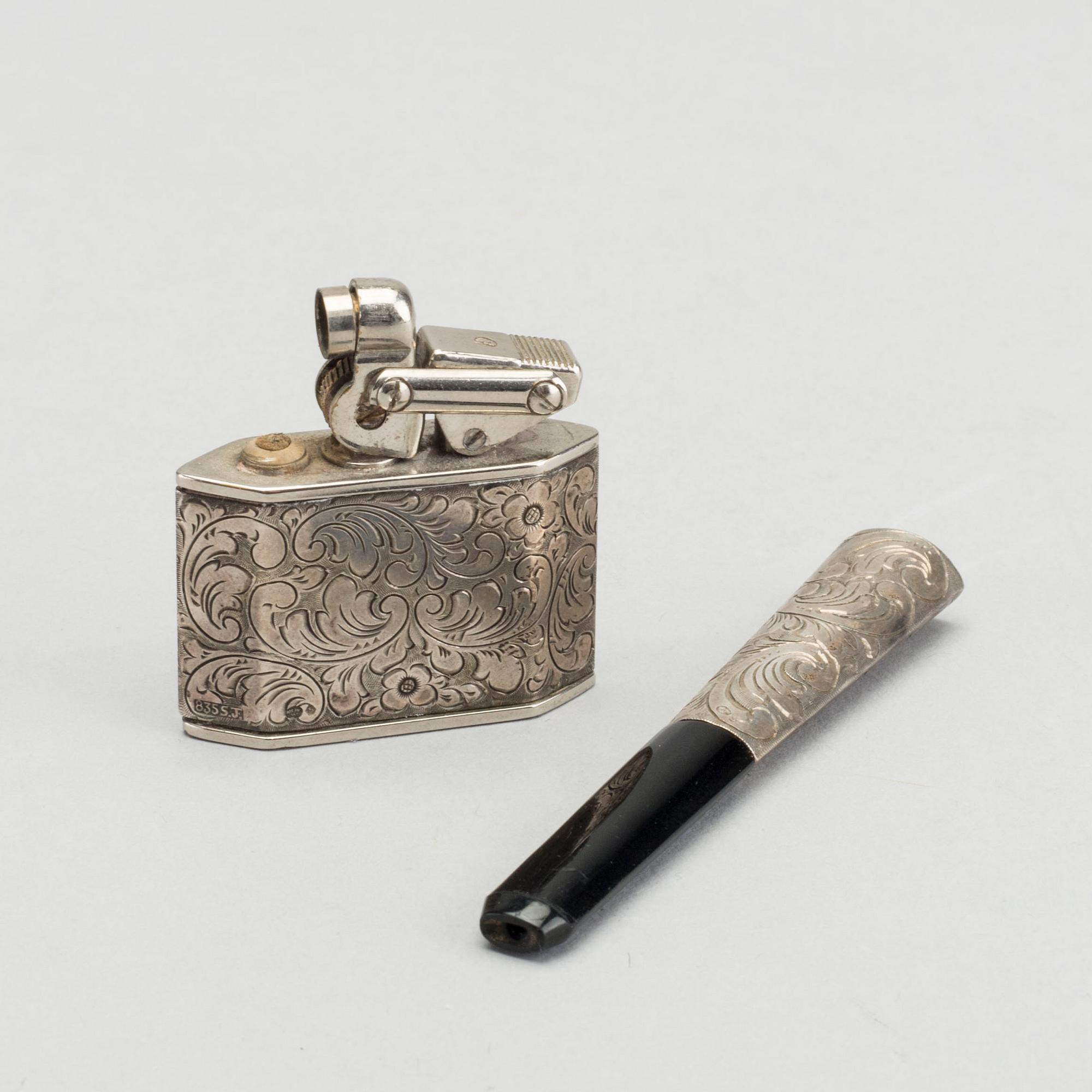 CIGARETTMUNSTYCKE SAMT TÄNDARE, silver, svenska importstämplar. 1900-talets första hälft.