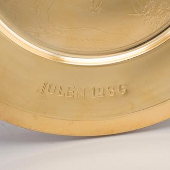 12 brass plates from Skultuna, late 20th century.
