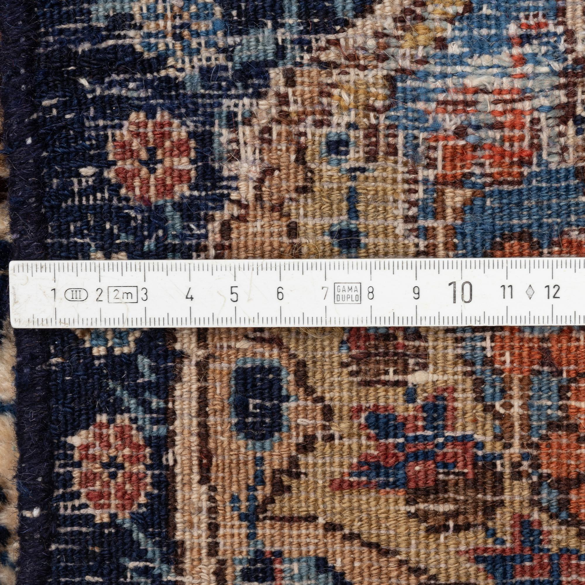 A Kashmar rug, c. 396 x 300 cm.