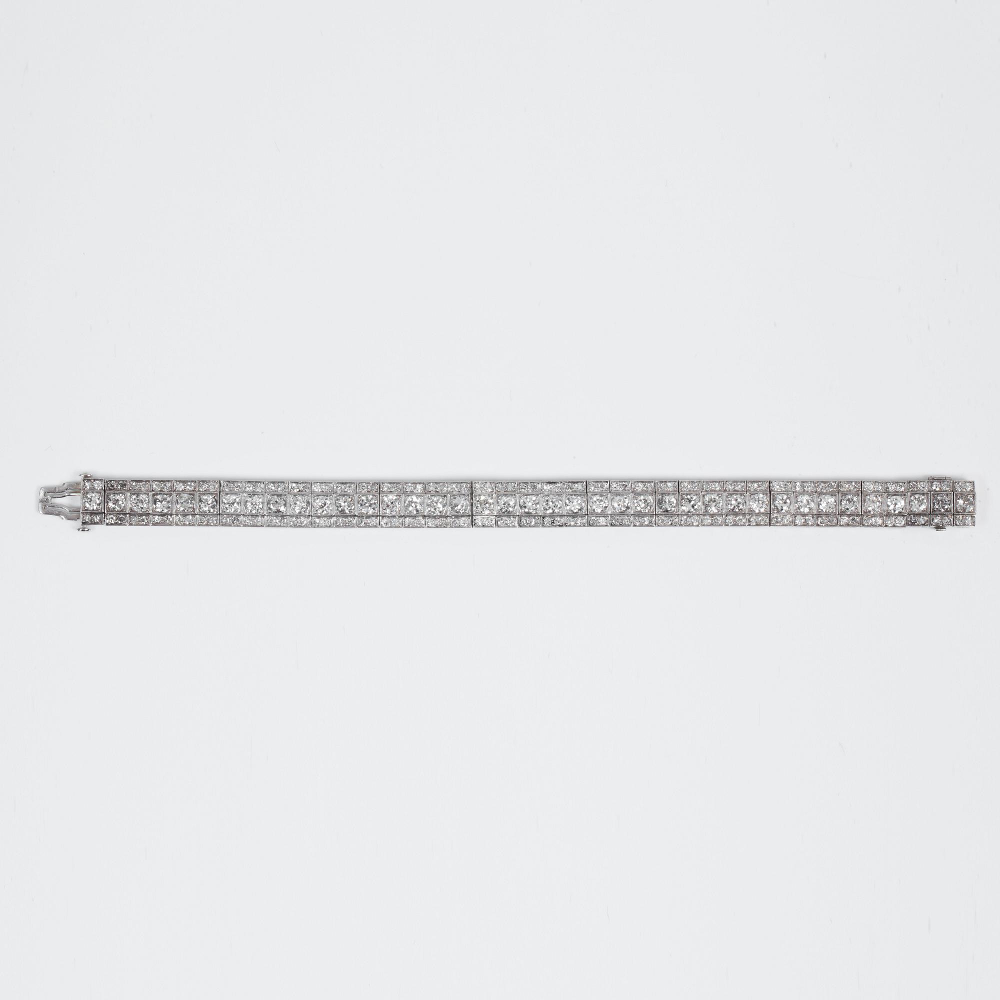 An Art Deco old-cut diamond bracelet. Total carat weight circa 11.00 cts.