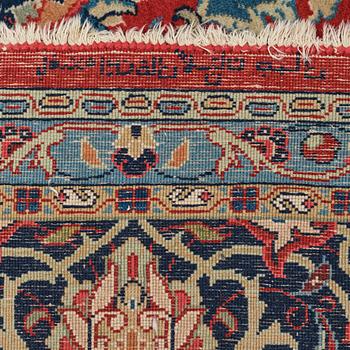 A carpet, a semi-antique/an old Persian, probably a Qazvin, ca 345-349 x 251,5-253 cm.