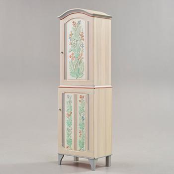 Carl Malmsten, an 'Iceland' cabinet, with carved and painted floral decoration.