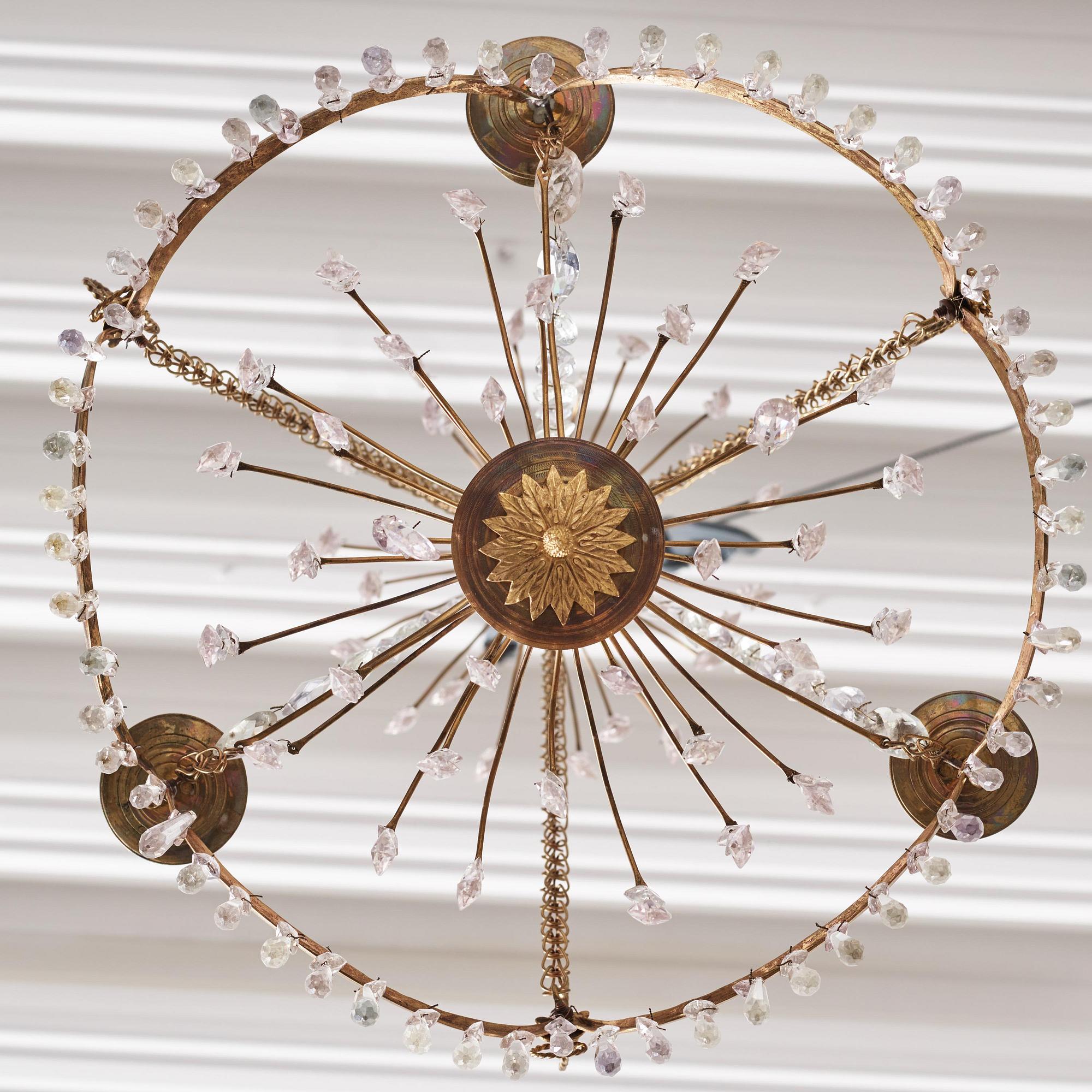 A Gustavian gilt brass and cut glass four-light chandelier, Stockholm, late 18th century.