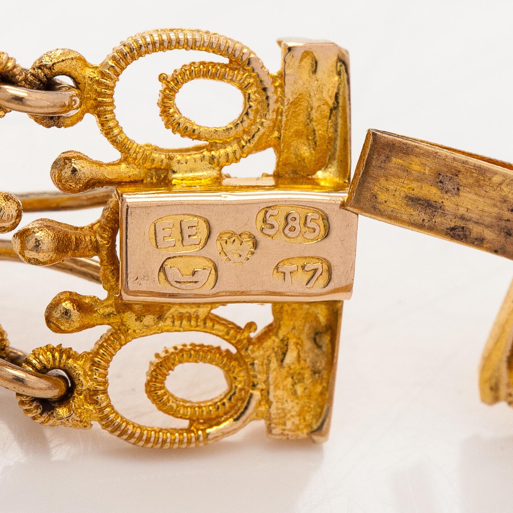 Esko Raitanen, collier, armband och örhängen, 14K guld, Helsingfors 1972.