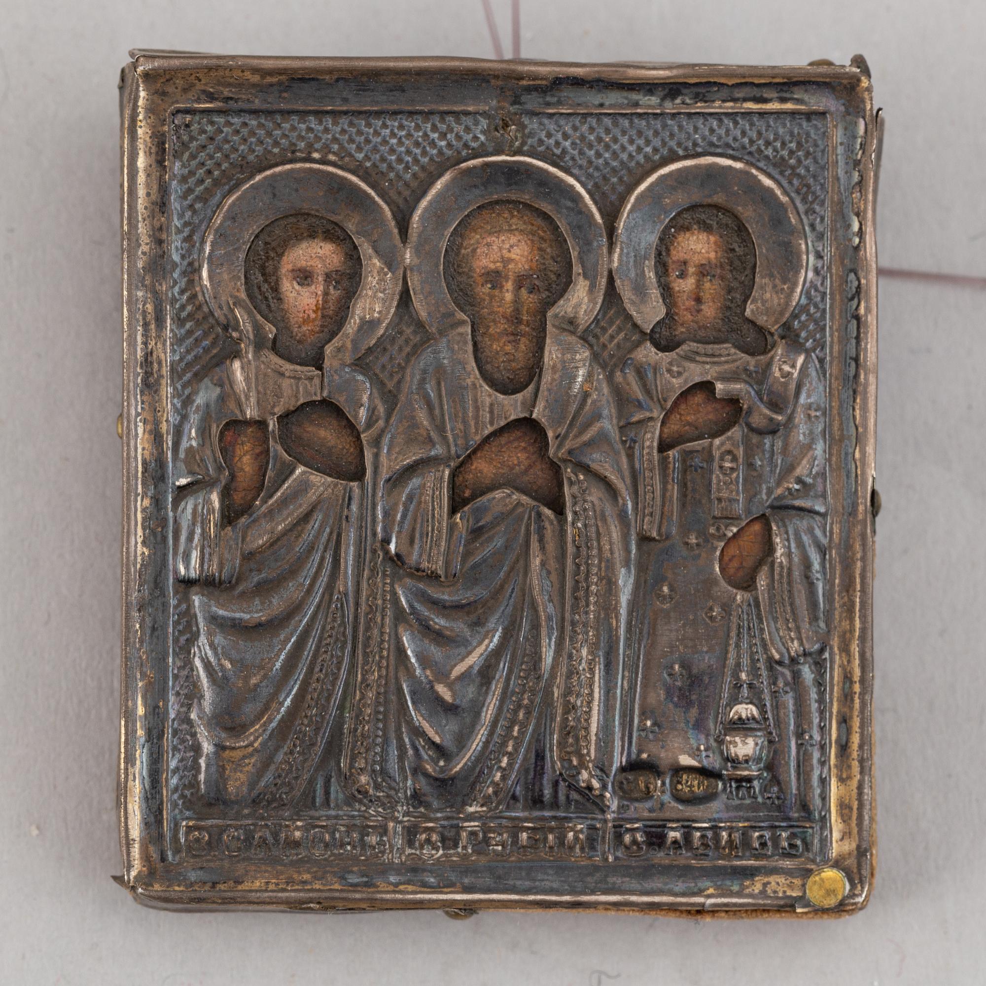 Two Russian 19th century travle icon, oklad in silver and parce-gilt, one with assayer mark AA 1890.
