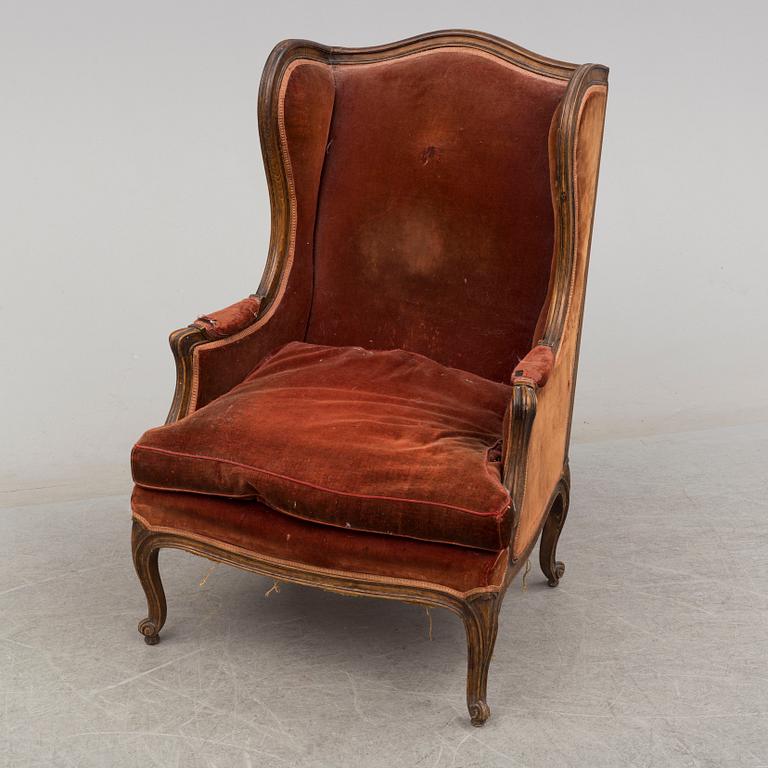 A 19th century rococo style easy chair.