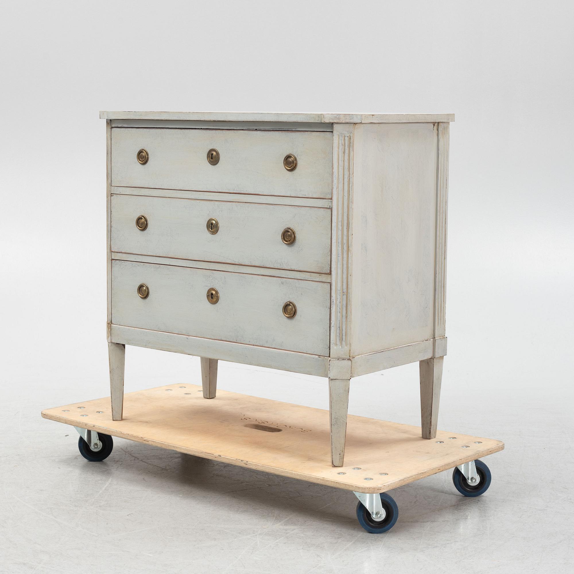 A Gustavian style chest of drawers, early 20th Century.