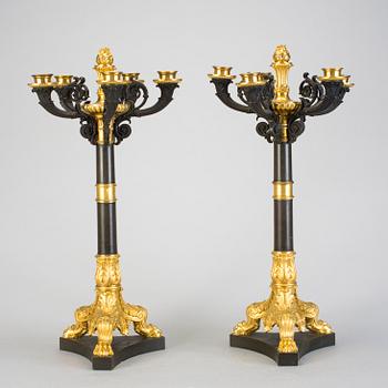 A pair of late Empire five-light candelabra in bronze from the middle of the 19h Century.